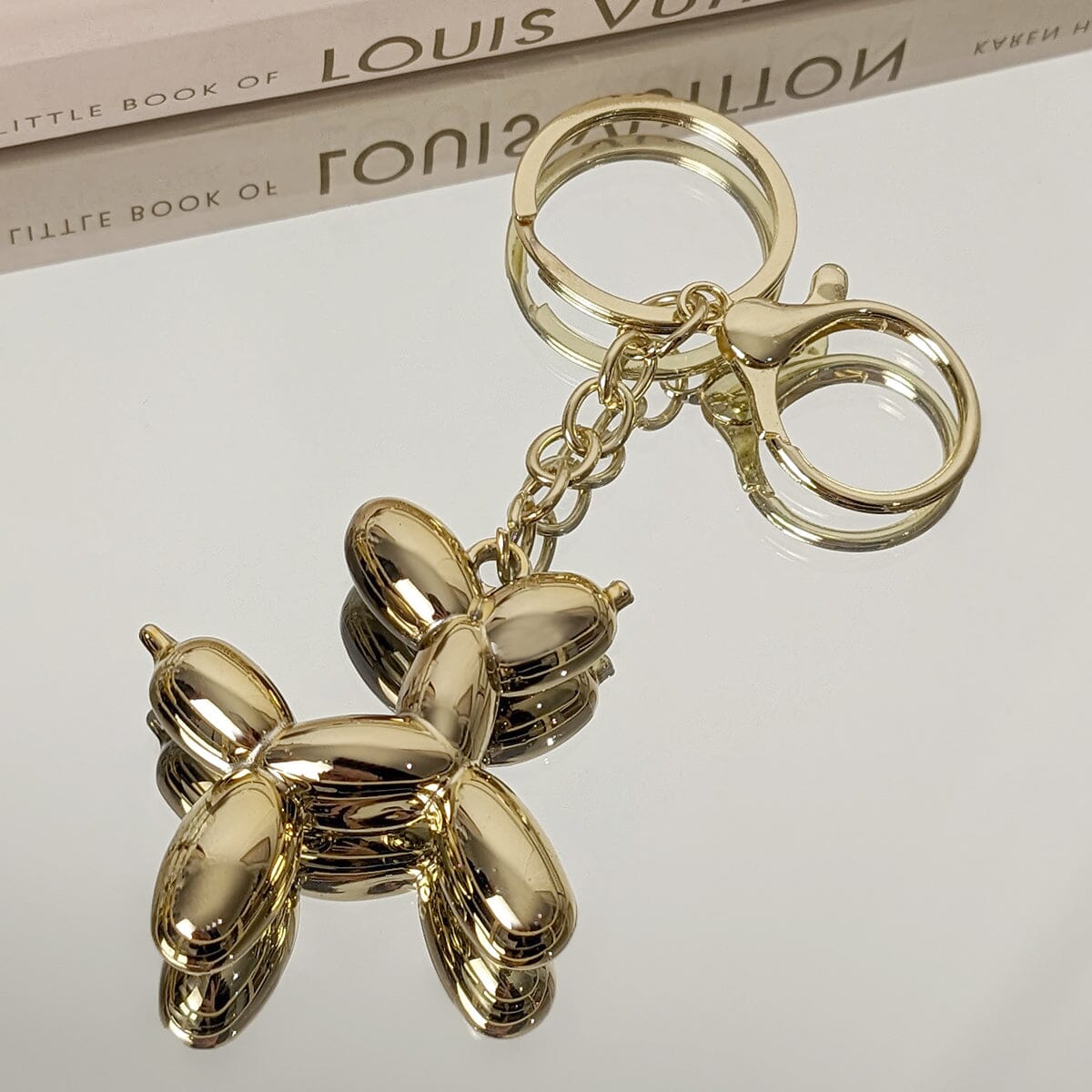 Gold Balloon Dog Keyring - Bridgnorth Furniture