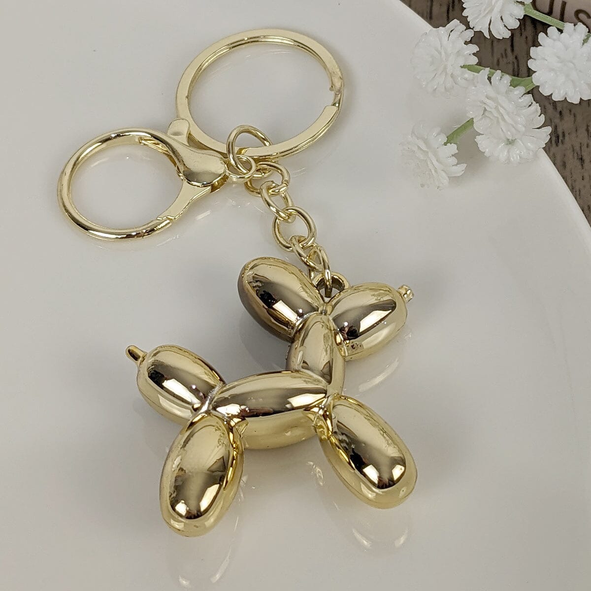 Gold Balloon Dog Keyring - Bridgnorth Furniture